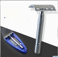 Chrome double edged safety razor with butterfly opening mechanism and storage box.