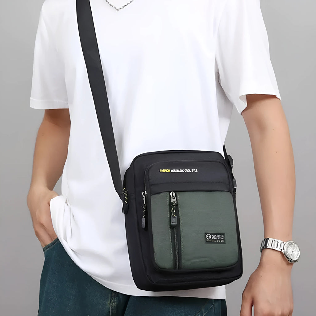 Men's green nylon casual crossbody messenger bag with a single shoulder strap.