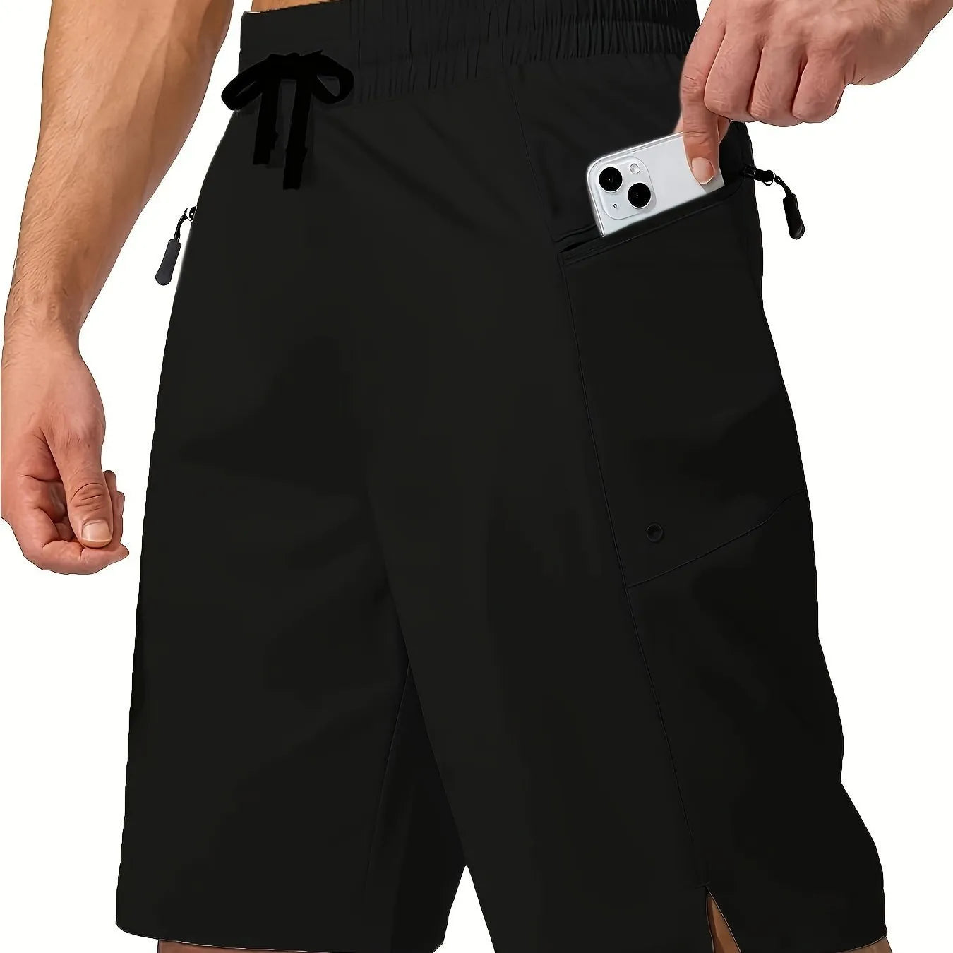 Man wearing straight cut quick-dry polyester beach shorts in a solid colour.