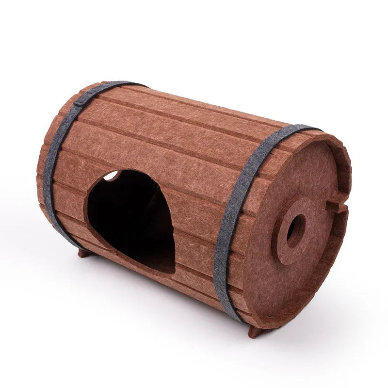 Assembled grey felt wine barrel-shaped pet bed for cats and small dogs.