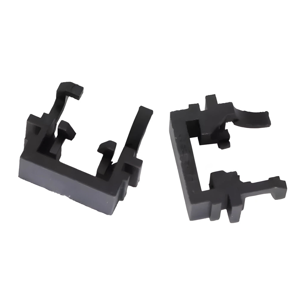 Black plastic LED headlight conversion holder for Ford cars, shown next to scale.