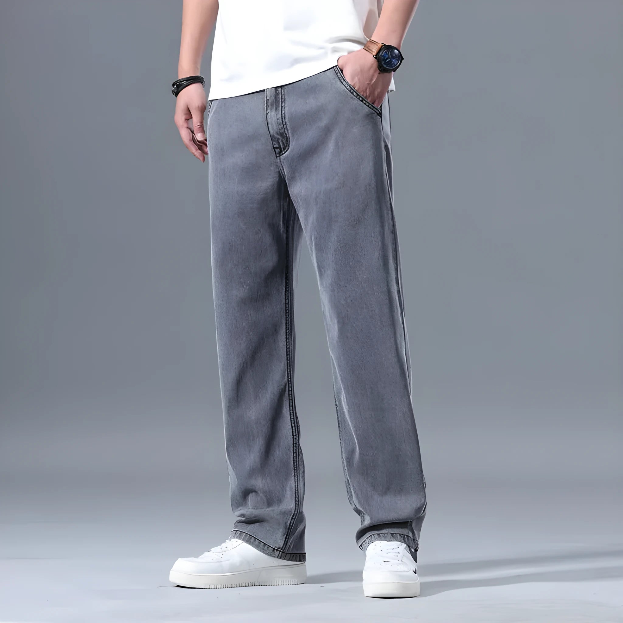 Men's straight leg loose fit lyocell jeans in blue and grey shades with zipper fly
