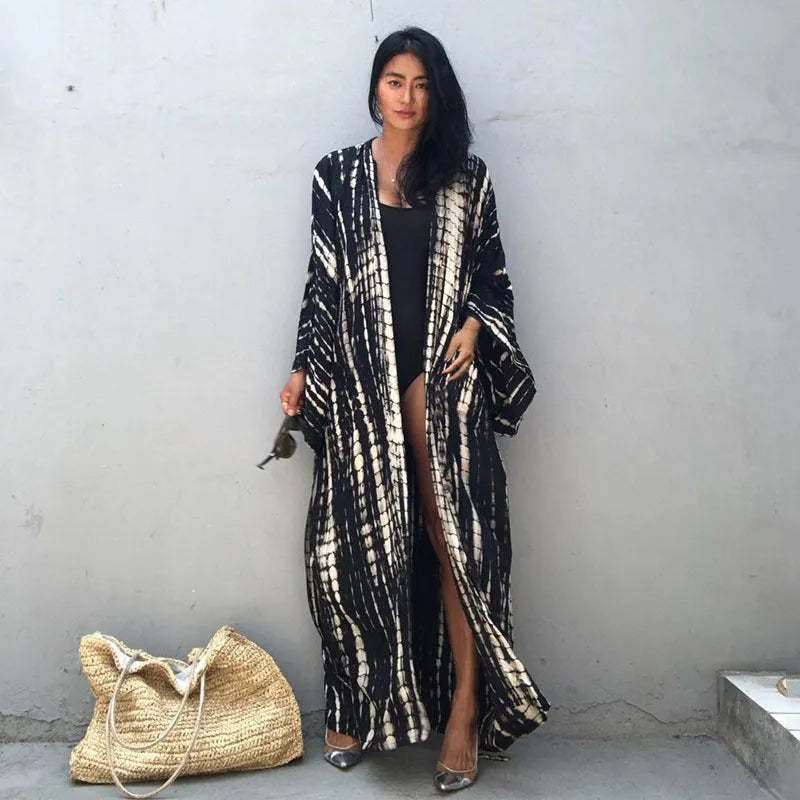 Women's printed cotton beach cover-up shirt in loose fit for sun protection over bikini.