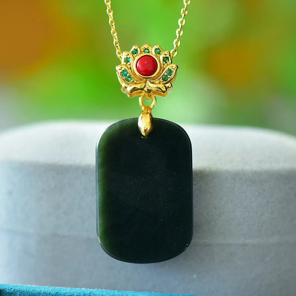 Flat natural Hetian Jade pendant with copper inlay design on a necklace chain