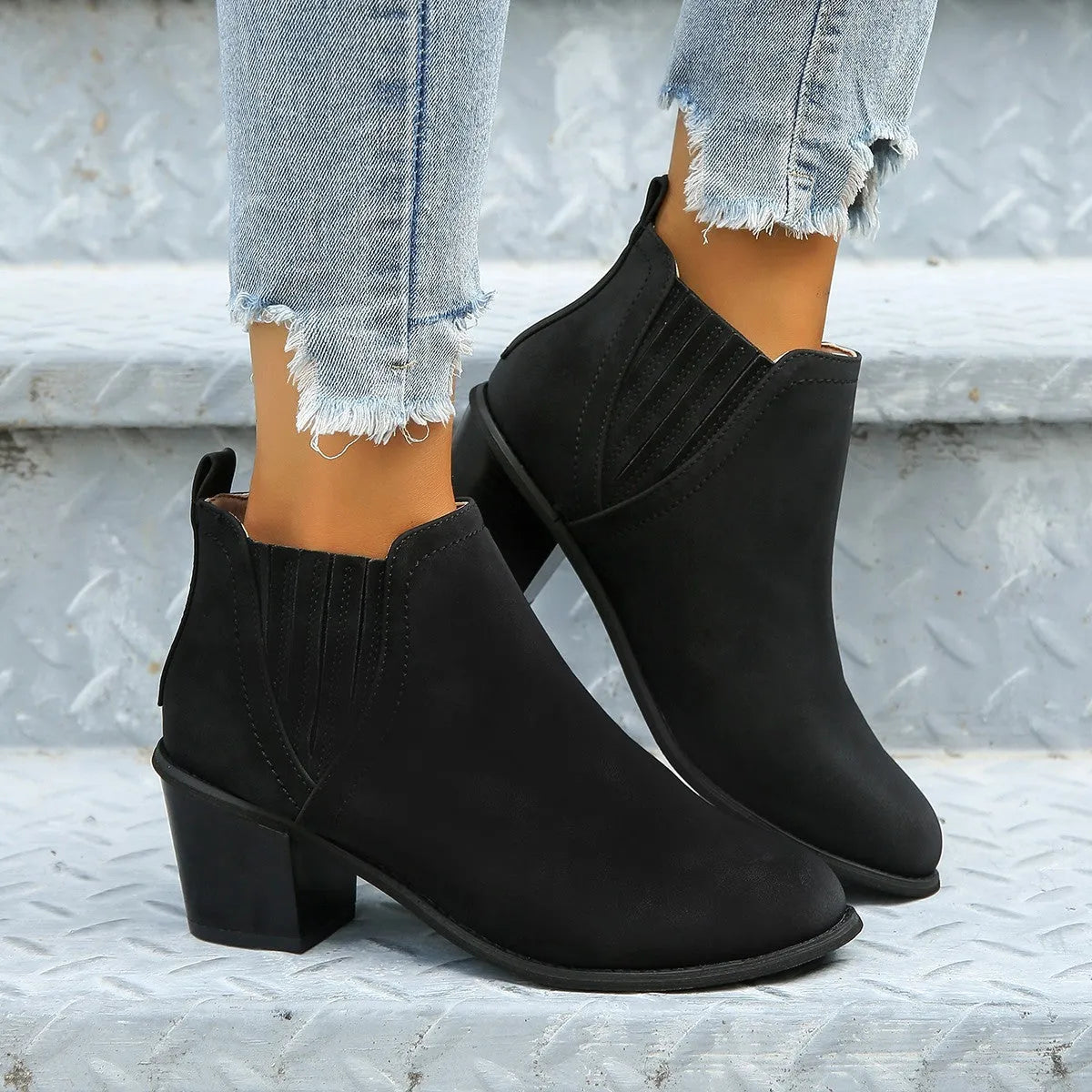 Women's black slip-on ankle boots with pointed toe and thick square heel for autumn winter wear