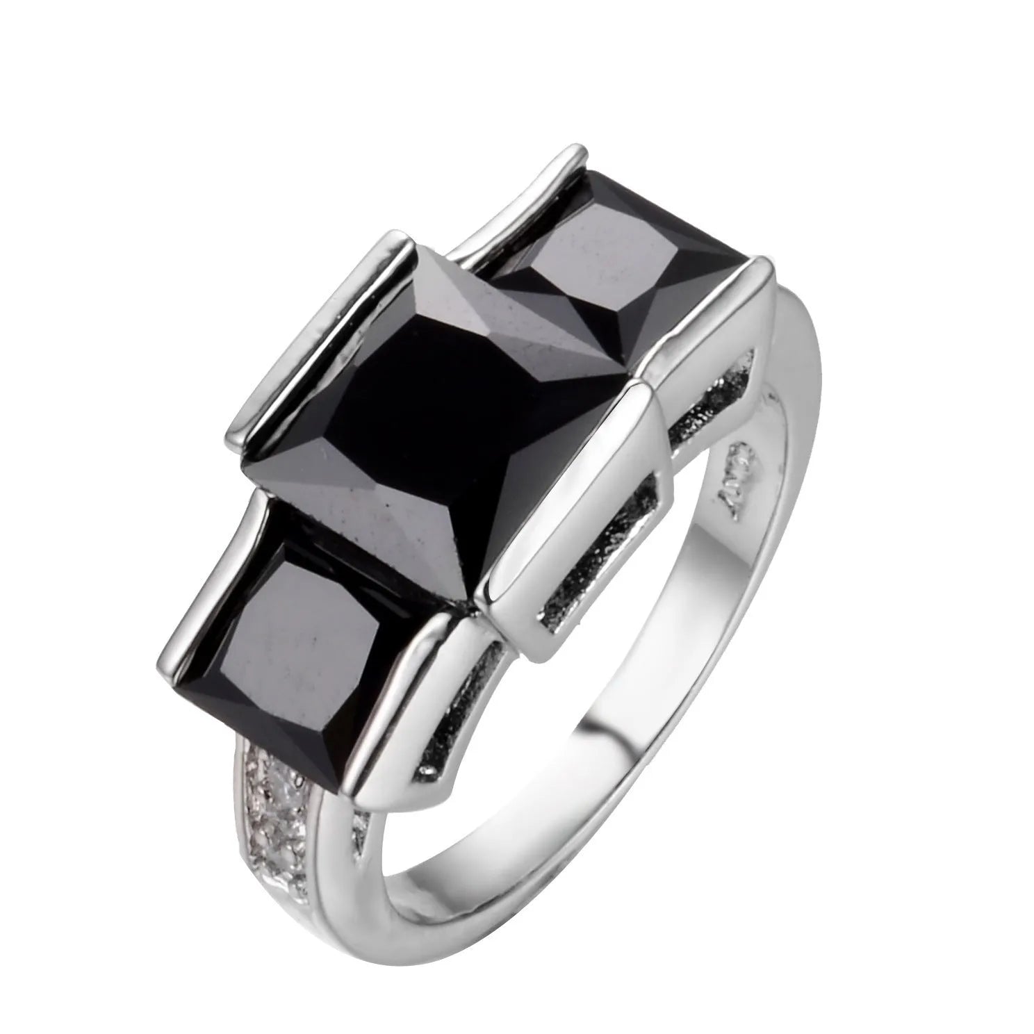 Geometric copper ring for women in champagne colour on a grey background, showing size 8.