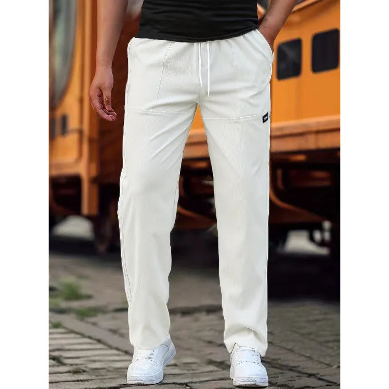 Men's polyester trousers in multiple colours including light grey, dark green, black for spring and autumn wear