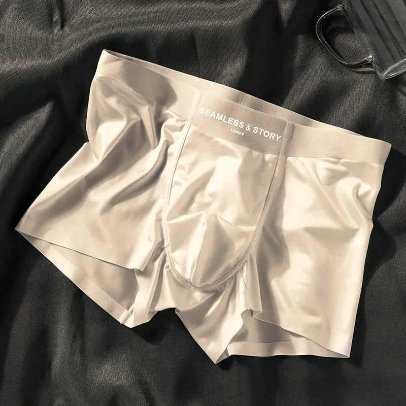 Men's light gray Ice Silk mid-waist underwear briefs laid flat.