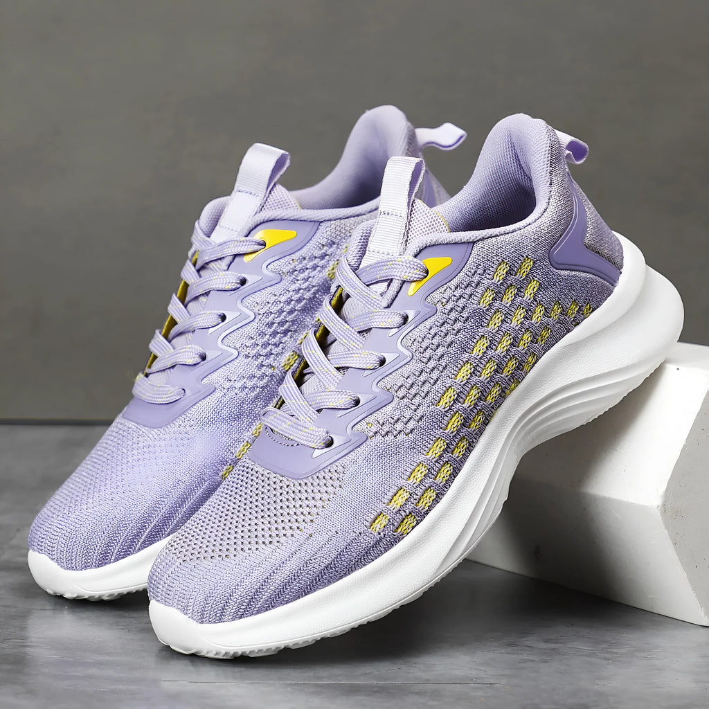 Women's lavender purple Flyknit running shoes with mesh fabric and striped pattern