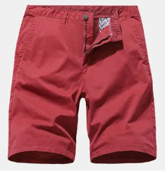 Men's loose fit blue denim casual shorts with no belt, shown in a straight cut short length