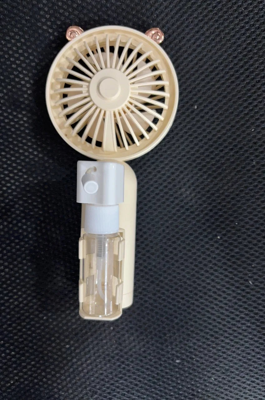 USB rechargeable plastic nozzle desk fan in apricot colour with compact 20cm width design
