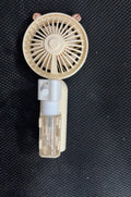 USB rechargeable plastic nozzle desk fan in apricot colour with compact 20cm width design