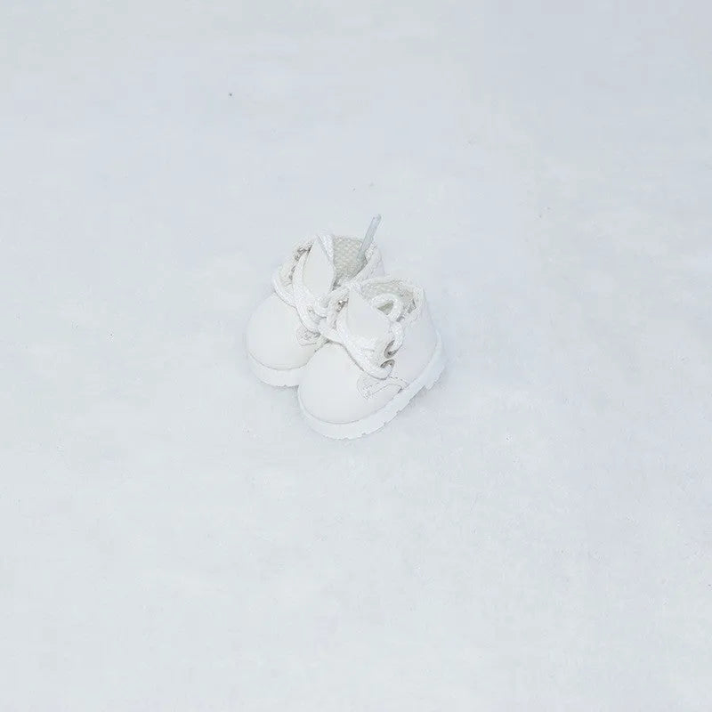 Set of miniature doll replacement shoes in various styles and colours for 17cm scale figures.
