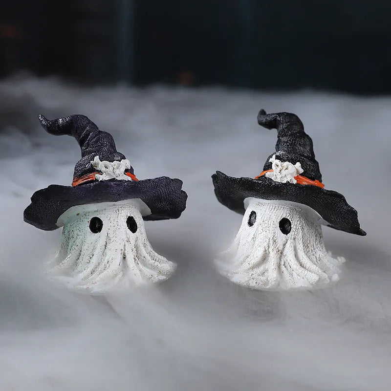 Resin wizard hat holiday ornament in purple or black, 7cm tall.