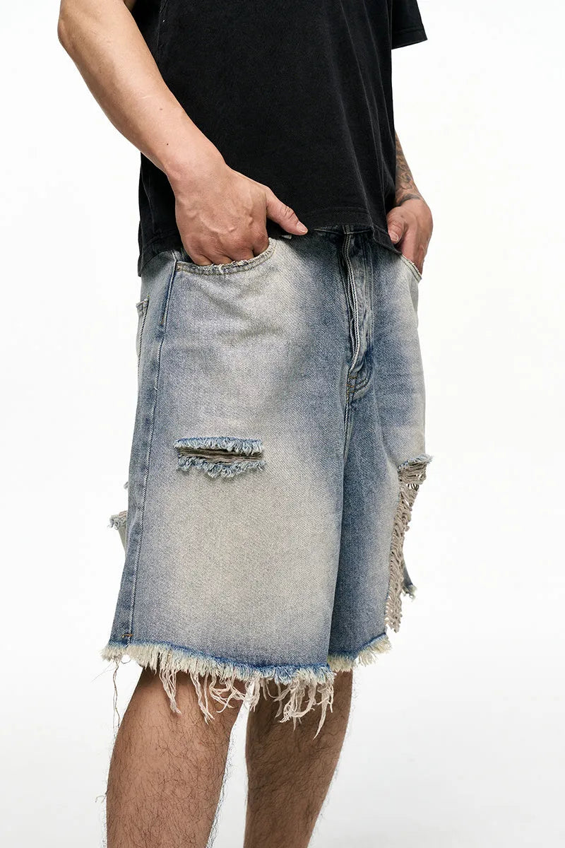 Men's light blue baggy denim shorts with wide leg retro washed design