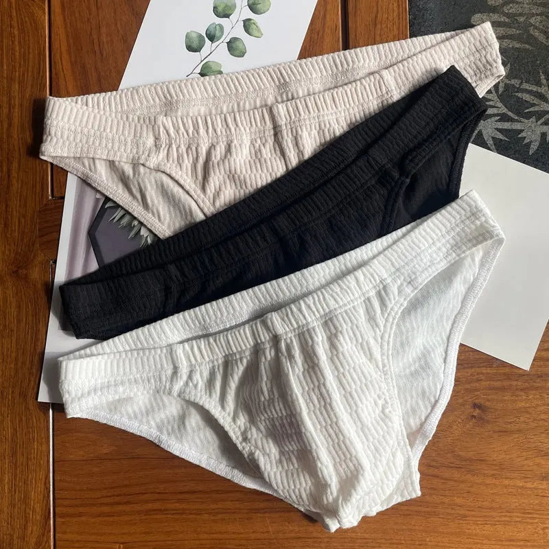 Men's triangle underwear briefs in pure cotton with mid-waist design and solid colour options