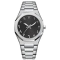 Men's steel bracelet quartz watch in business style on a wrist.