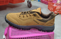 Men's army green low-top hiking shoes on a white background, showing mesh lining and viscose sole.