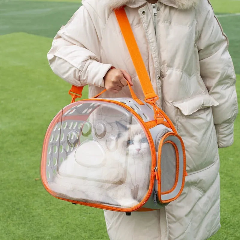 Transparent space capsule cat backpack carrier in grass green colour showing hard EVA construction and dimensions for cats up to 9kg