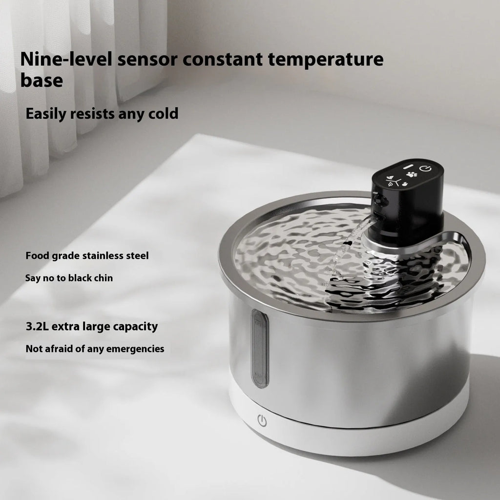 Stainless steel heated pet water fountain for cats and dogs on a nine-gear temperature base.