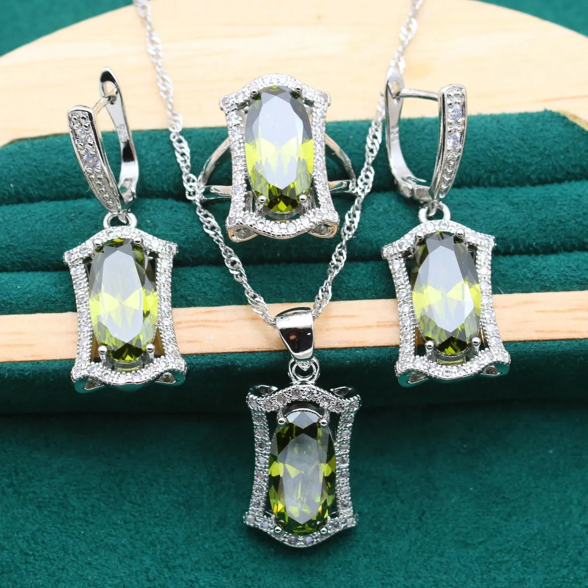 Women's anti-allergy zircon dinner jewellery set showing matching necklace, earrings, ring, and bracelet in alloy with snake bone chain