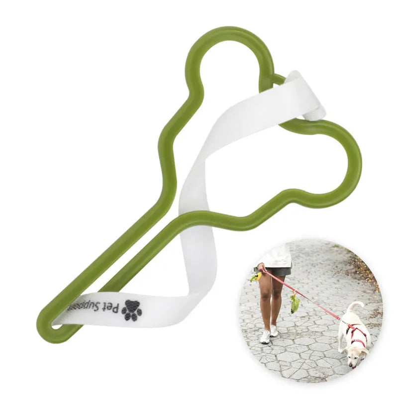 Hands-free dog poo bag holder with velcro strap attached to a dog lead.