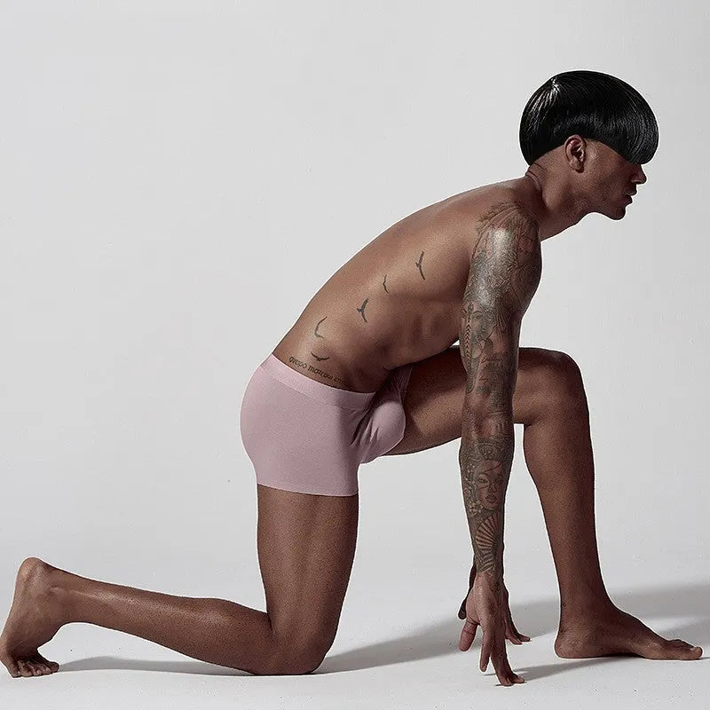 Men's seamless Modal underwear in solid colours showing mid-waist design