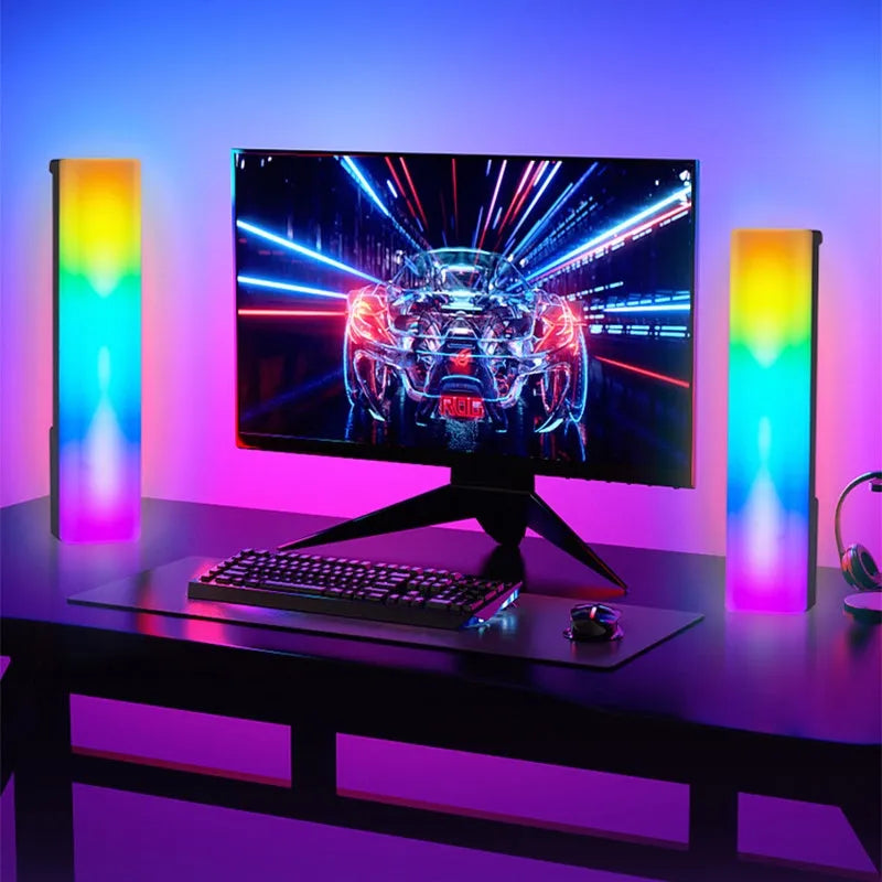 Black and white 3D RGB voice-activated music rhythm ambiance lamp on a tabletop.