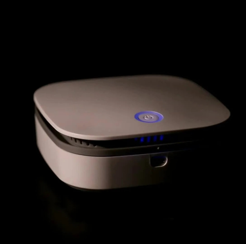 White USB-powered air purifier and disinfection machine for car and small room use.