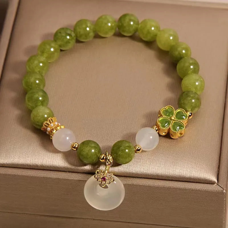 Natural stone green tourmaline women's bracelet with four-leaf clover charm and safety buckle closure