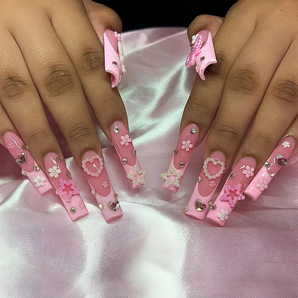 Super long artificial nails with French spot drill, a bow, and a love pattern in colour XB-70-48.