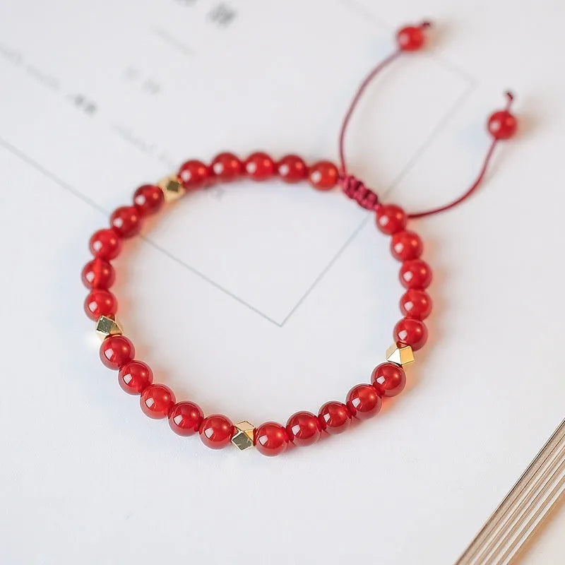 Hand-woven red agate beads bracelet with diamond-shaped arrangements in ethnic style design