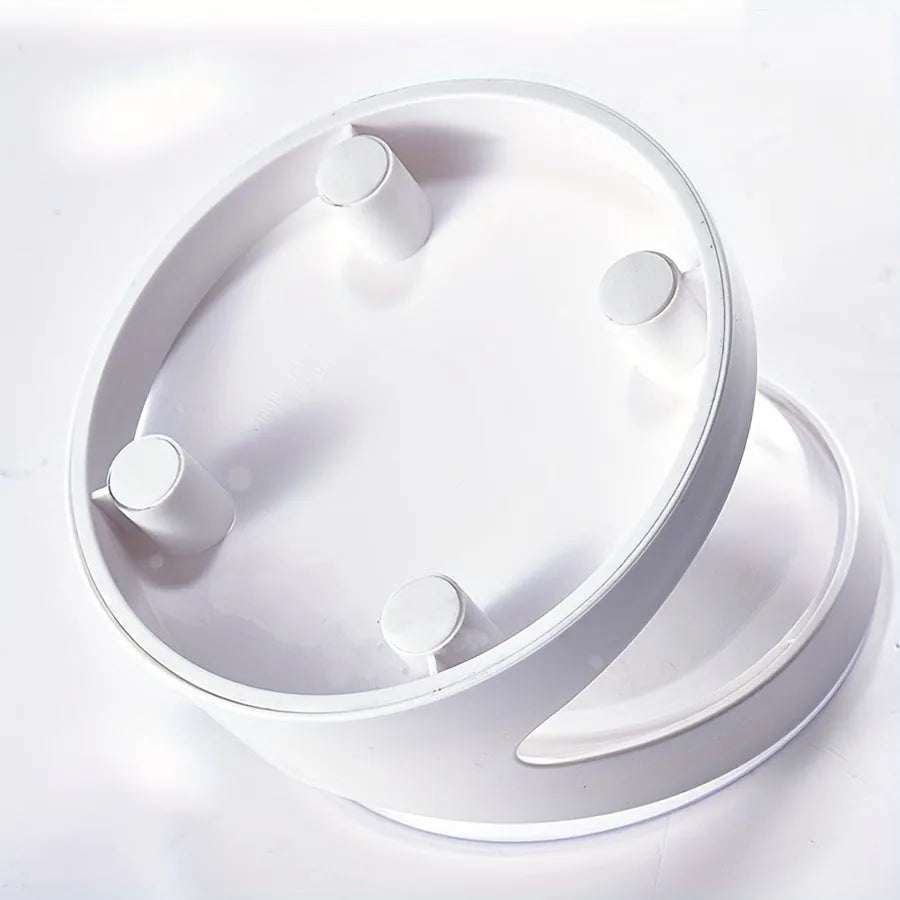 Clear plastic tilted cat food dish on a 7cm tall white plastic elevated base.