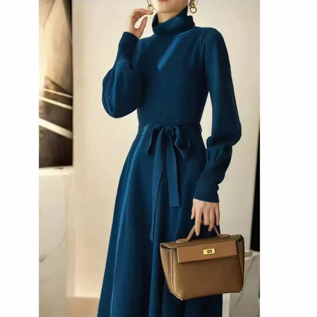 Women's rose red turtleneck long sleeve knit dress with elastic waist and loose mid-length skirt.