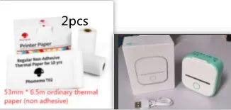 Phomemo T02 mini thermal label printer in white, showing front view with roll of sticky paper