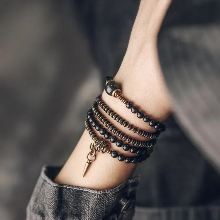 Black geometric stone bead bracelet with multi-layered design and colourful retro styling