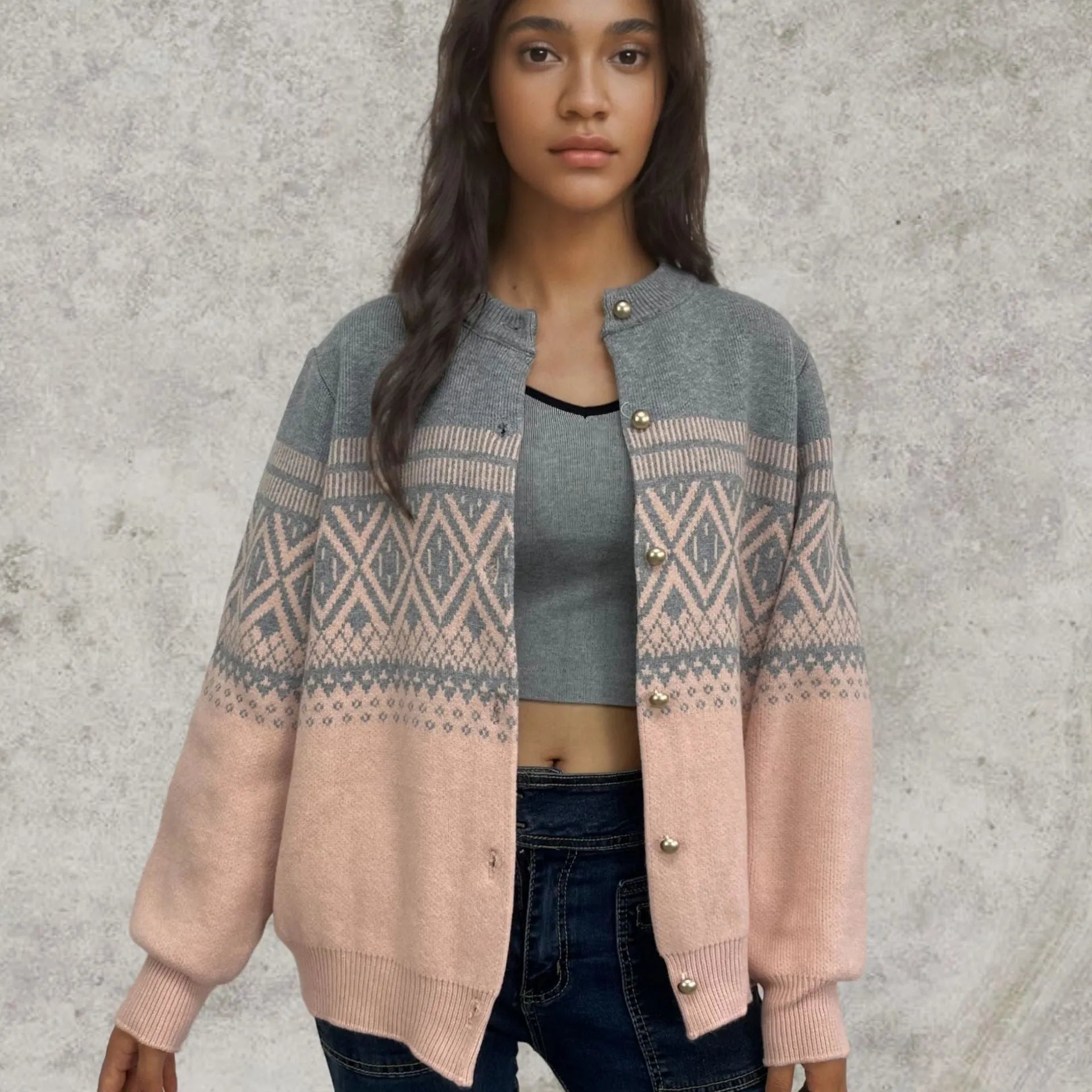 Women's red alpaca wool cardigan with grey diamond knit pattern and long sleeves