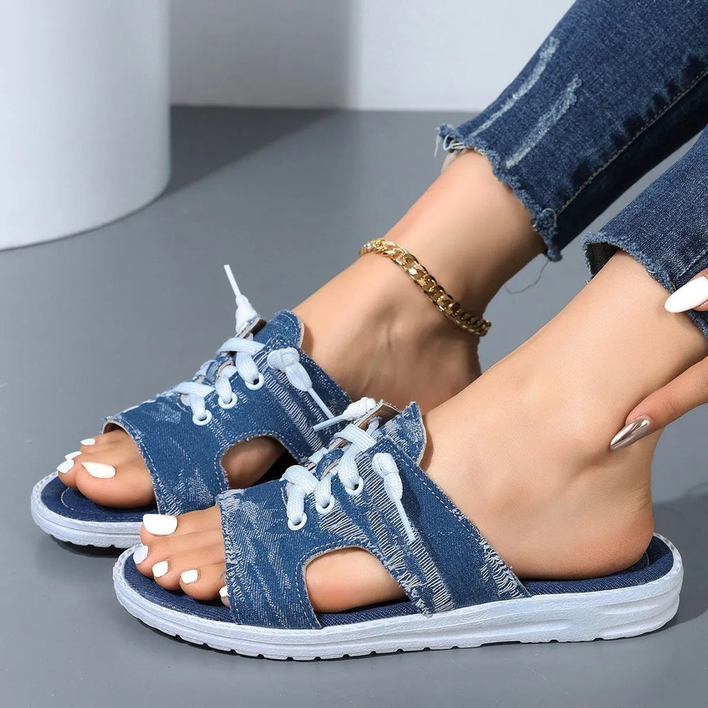 Blue women's Roman style canvas slippers with cloth lining and rubber soles