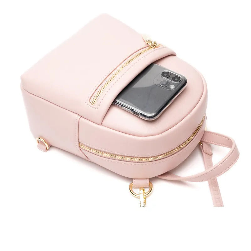 Soft PU mini backpack in multiple colours showing outer pocket and street style design