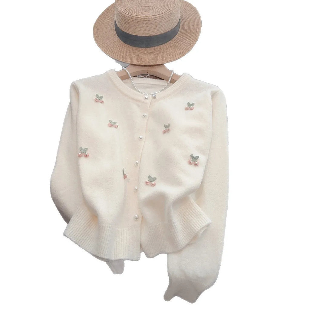 Women's beaded cardigan sweater in free size available in four colours with round neck design