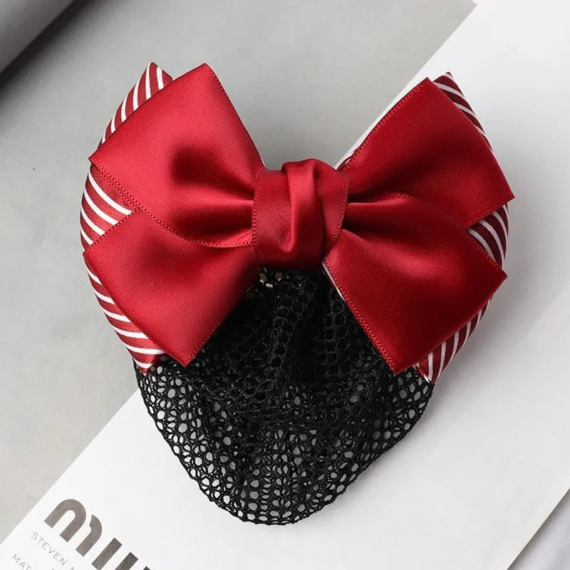 Professional hair clip with a black net pocket and a red flower bow ornament on a white background.