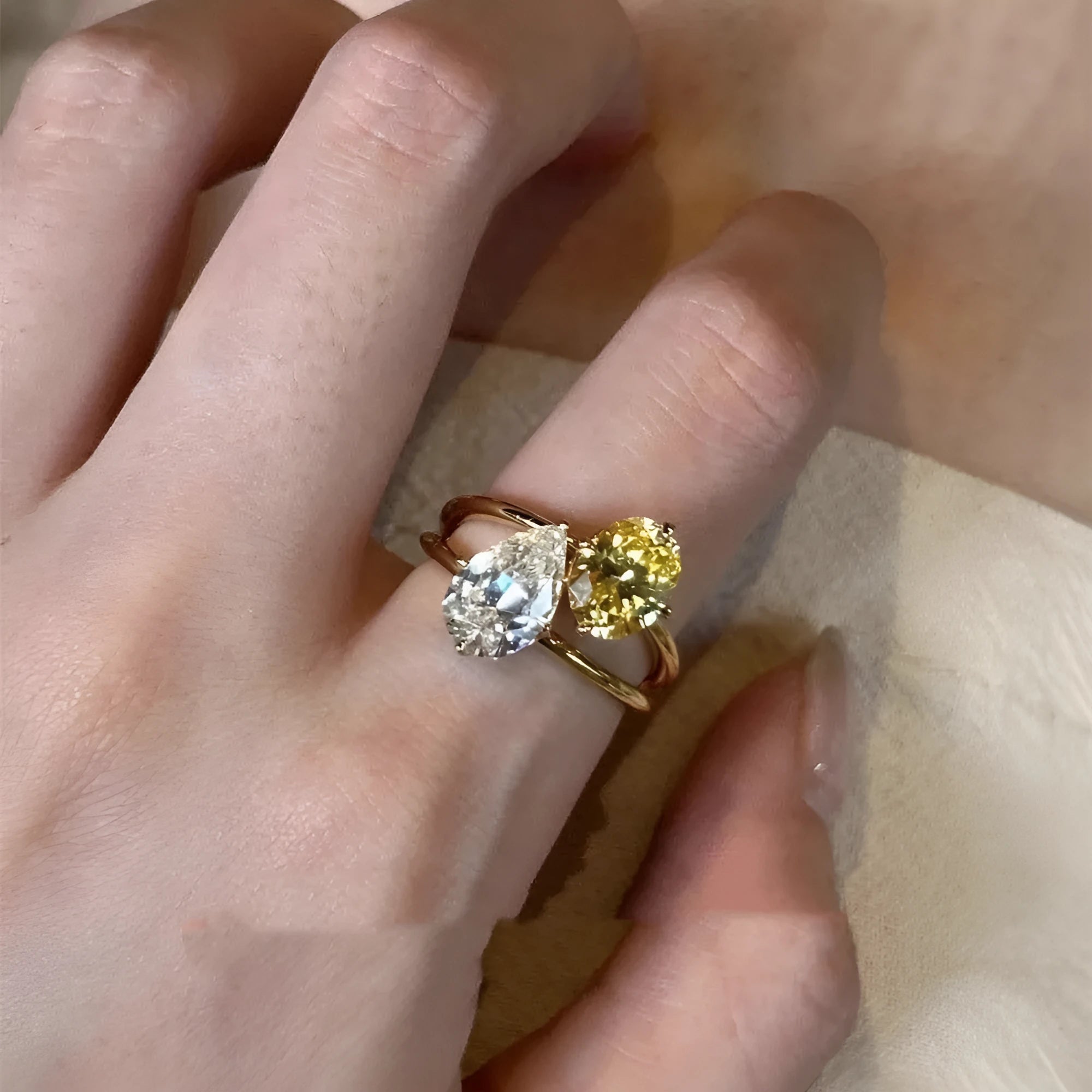 Women's geometric open ring with water drop double sheng stone and contrasting colour zircon on copper band
