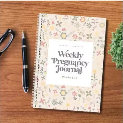 A5 pregnancy weekly diary notebook showing structured format for weekly entries