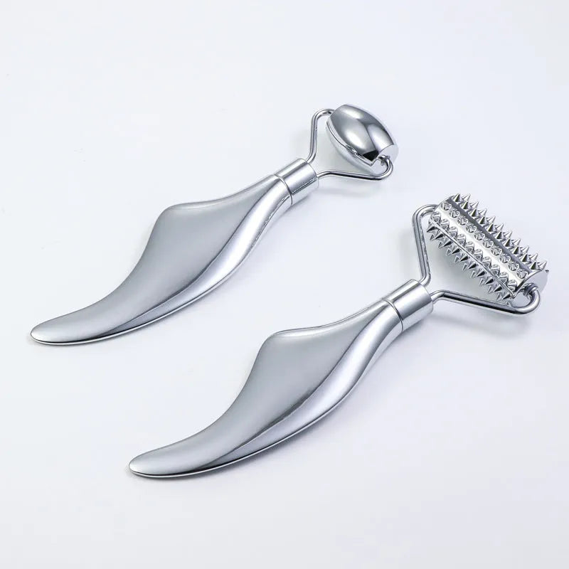 Stainless steel facial massage board with double head roller and heart-shaped eye poking stick for acupressure therapy