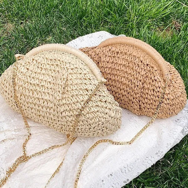 Women's straw beach shoulder bag in khaki colour with chain detailing and shell shape