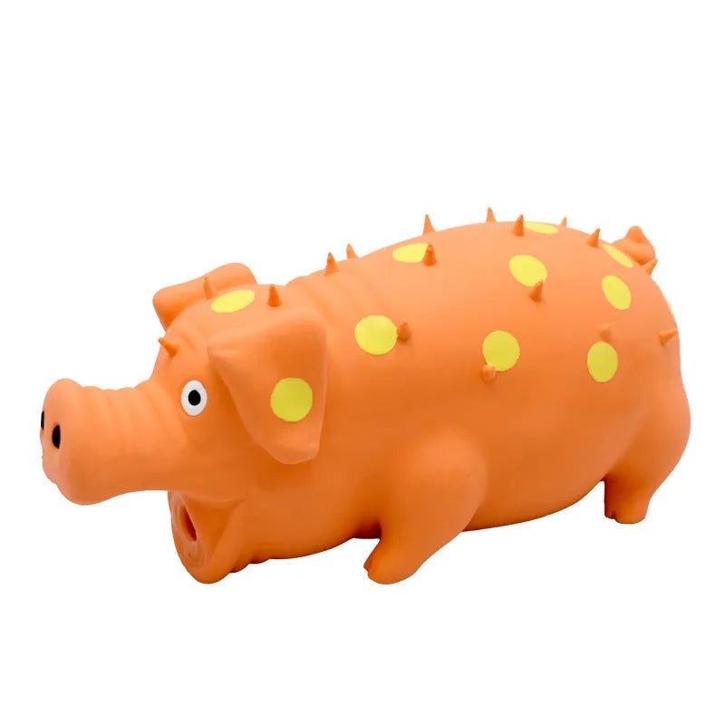 Colourful pig-shaped latex dog chew toy with textured surface for teeth cleaning