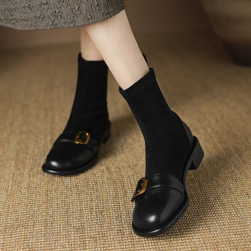 Women's black low heel Martin boots with round toe and front lace-up closure
