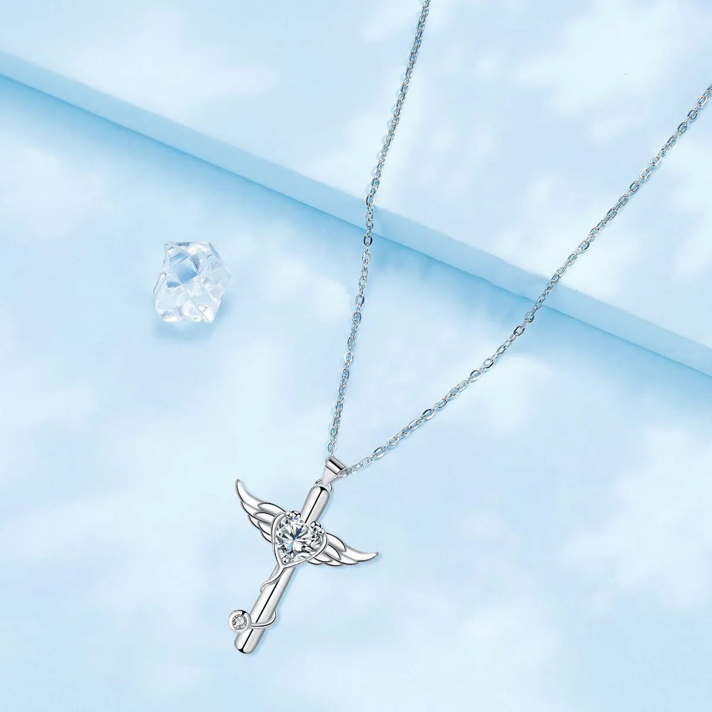 A copper stethoscope necklace with a cross and wings pendant in Red Diamond finish