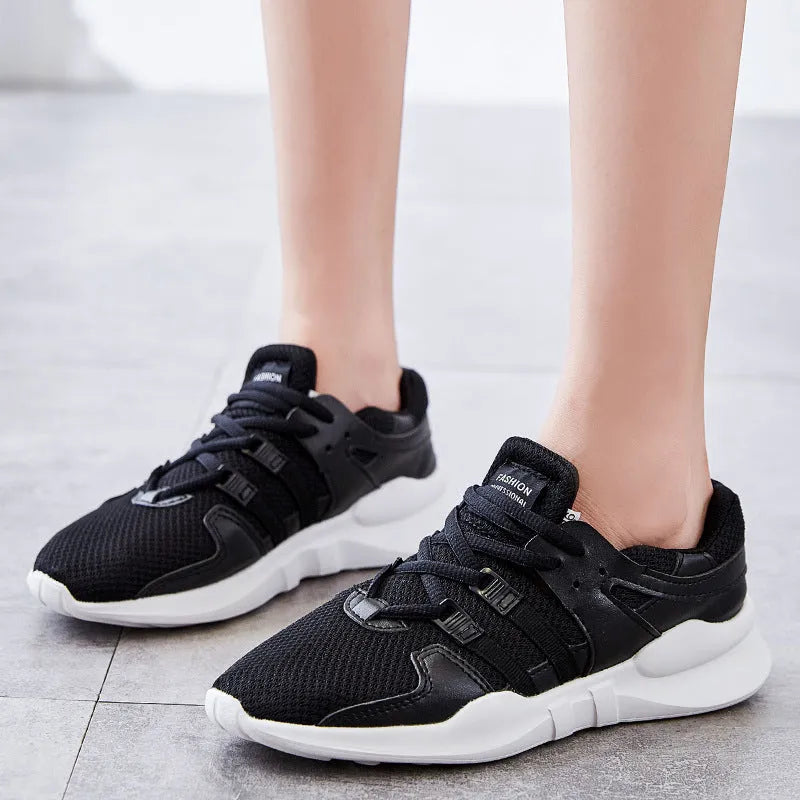 Breathable hollow-out mesh casual sneakers in black and white colour options with EVA sole