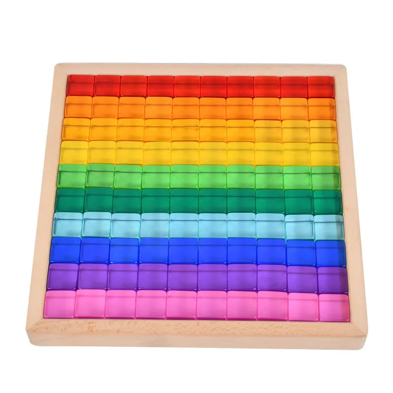 Wooden building block set with clear acrylic high permeability tiles on a tray, 29cm square